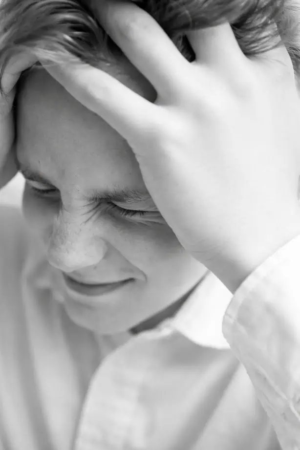 individual experiencing mental strain from drug use