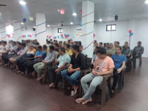 Residents gathered for a community session at Live Life Rehab rehabilitation centre in Gujarat