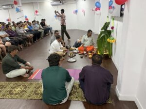 Patients and staff during a puja ceremony at Live Life Rehab de-addiction centre, Nadiad
